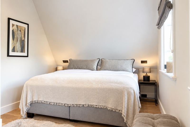 Eines von vier Schlafzimmern im Ferienhaus Hygge Hus in Morsum