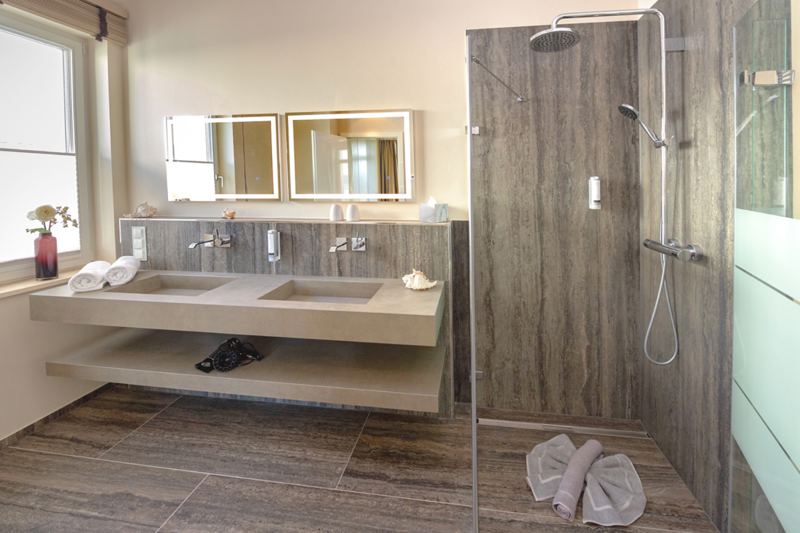 Das Bad en suite mit Walk- In- Dusche