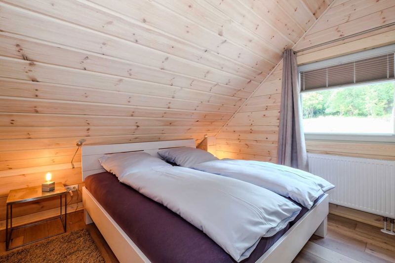 Drei Schlafzimmer mit Doppelbetten beherbergt das Chalet Blickfang in Wernigerode